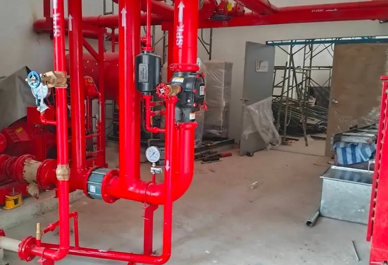 red pipes being welded